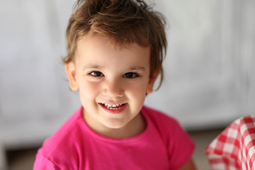 Cute little girl with short hair