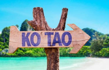 Ko Tao wooden sign with beach background