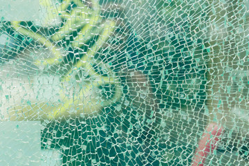 Covered with small cracks the glass. Background.