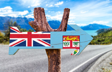 Fiji wooden sign with road background