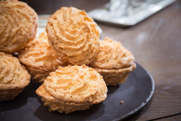 Almond cookies on wooden table