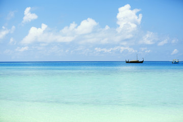 Fototapeta na wymiar View of beautiful blue ocean water with ship in resort