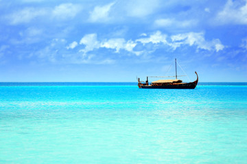 Fototapeta na wymiar View of beautiful blue ocean water with ship in resort
