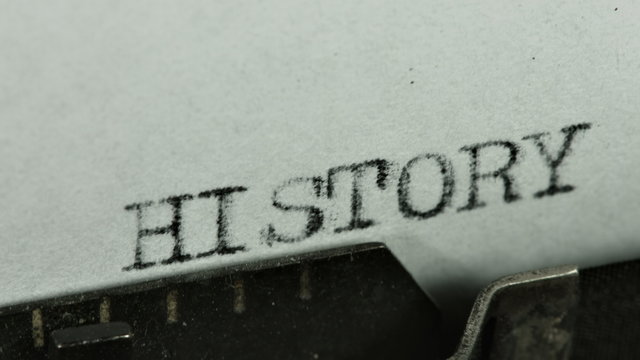 Vintage typewriter writing words _&mdash;&ndash; history themes