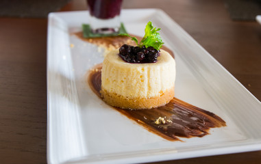 Blue berry cheese cake served with berry sauce