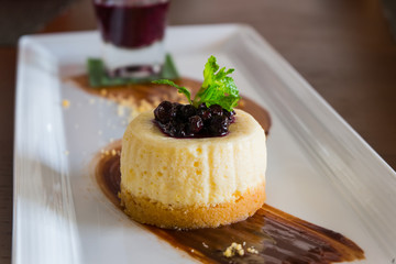 Blue berry cheese cake served with berry sauce
