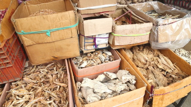 GALLE, SRI LANKA - MARCH 2014: Boxes of dried fish displayed in the local market in Galle. Galle is the administrative capital of Southern Province, Sri Lanka and is the district capital of Galle District. 