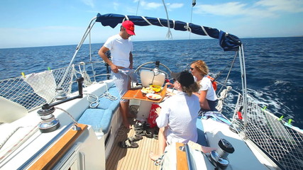 Young adults enjoying a trip on sailing boat on the Adriatic sea in Croatia.