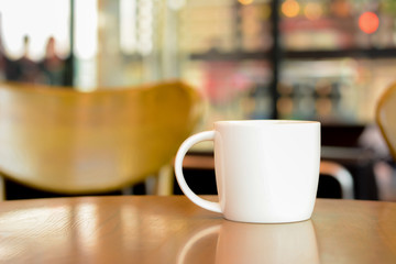 Coffee cup on the table in coffee shop