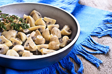 The mushrooms in the pan