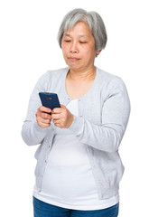 Asian old woman use of cellphone