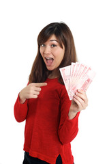 Asian girl holding a few bills of Chinese money