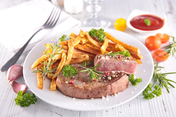 grilled steak and french fries