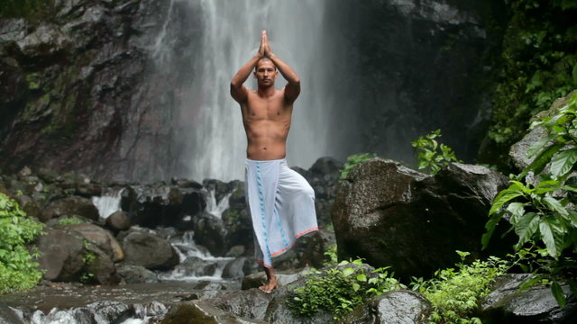 man at waterfall