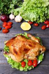 baked fried chicken carcass with vegetables