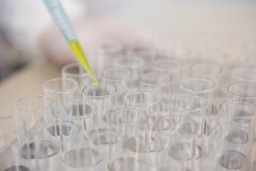 Scientist injecting tubes