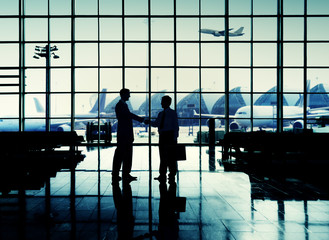 International Airport Business Travel Airport Handshake Concept