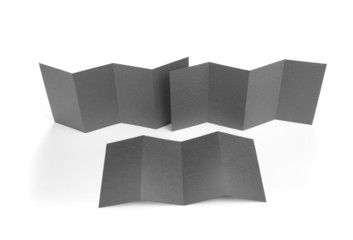 Blank folded paper leaflet or flyer mockup.