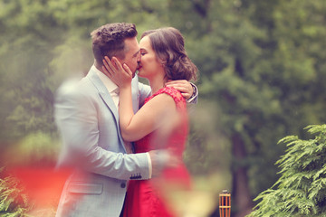 Beautiful elegant couple in nature