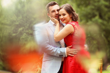 Beautiful elegant couple in nature