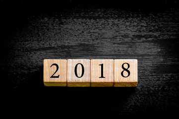 Year 2018 isolated on black background with copy space