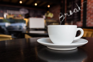 Coffee cup on the table at the coffee shop.