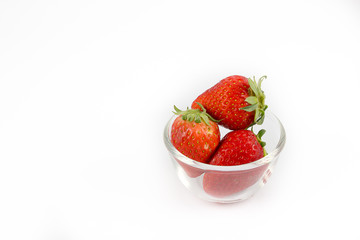 red strawberry on white background