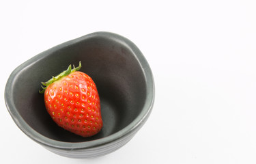 red strawberry on white background