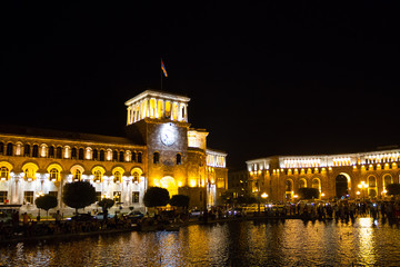Fototapeta na wymiar Night Yerevan and clock tower. Armenia, Hraparak