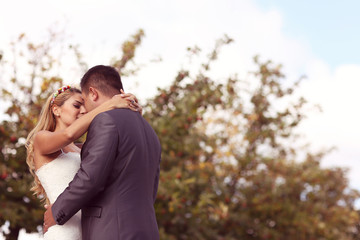 Fototapeta premium Love bride and groom outdoor