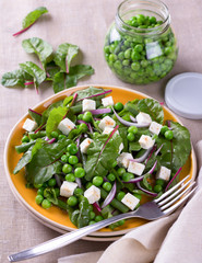 Salad with green peas, beans, red onion and feta cheese