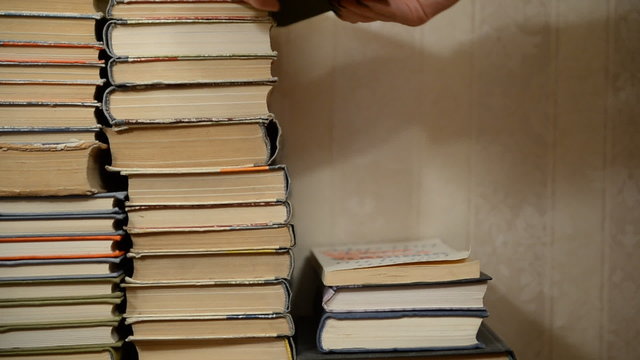 A stack of old books. Cleaning bulkhead home