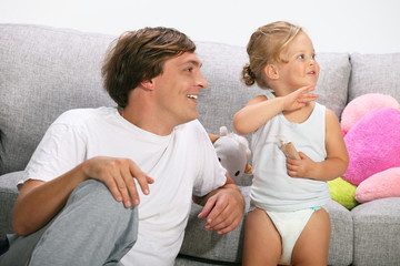 Happy family, father and daughter playing