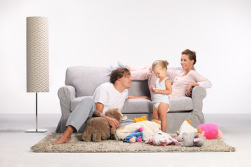Happy family playing in the lvingroom