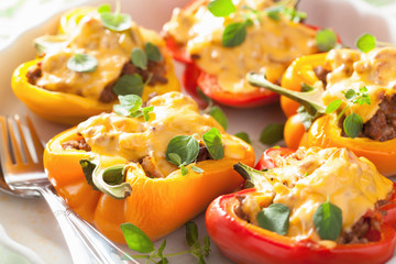 stuffed colorful peppers with meat cheese vegetables