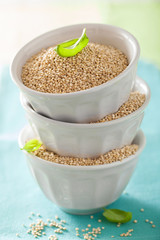 raw healthy quinoa in bowl