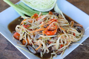 spicy papaya salad with salted crab and fermented fish