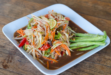 spicy papaya salad with salted crab and fermented fish