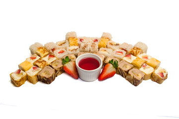 Set sushi with sweet coconut, strawberries and cheese