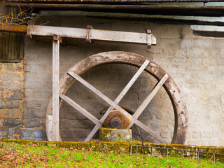 Fototapeta na wymiar Old mill water wheel
