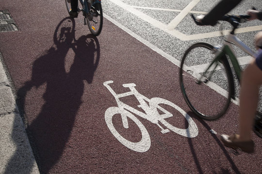 Fototapeta Cycle Lane with Cyclist in Dublin