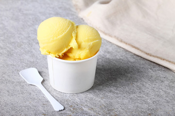 passion fruit sorbet in white cup - obrazy, fototapety, plakaty