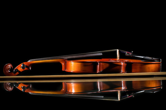 Isolated violin on black background