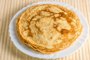 stack of pancakes on a plate close up