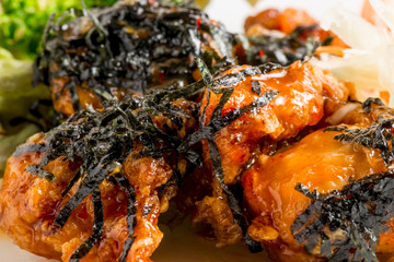 serving of chicken in sweet and sour sauce