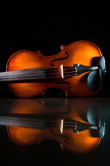 Isolated violin on black background