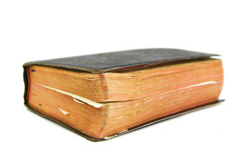 Old book with slightly unfocused back on a white background