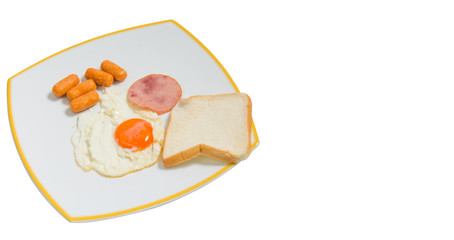 breakfast with ham , fried eggs on white plate. for text