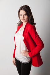 Young beautiful woman in red jacket