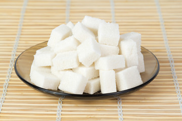 Sugar cubes on a plate